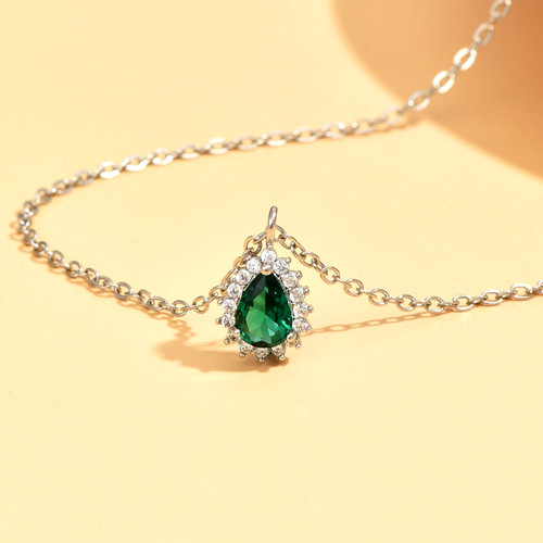 Gold emerald cubic zirconia - gold,